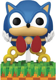 "Funko Pop! Ring Scatter Sonic (918) – Édition exclusive Entertainment Earth de Sonic The Hedgehog. Figurine en vinyle représentant Sonic en pleine action, perdant ses anneaux sur une base pixelisée. Un incontournable pour les fans de SEGA et de rétro-gaming.