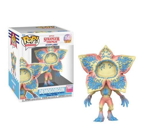 Funko Pop! Stranger Things – Demogorgon Scoops Ahoy (N°1547). Figurine colorée du Demogorgon en version sherbet rose, bleue et jaune. Une édition exclusive inspirée de la boutique Scoops Ahoy d’Hawkins.