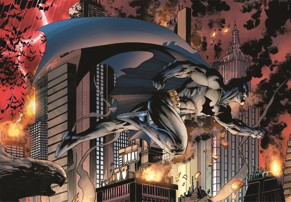 "Puzzle DC Comics – Batman – Gotham en feu – 1000 pièces – Clementoni. Illustration explosive du Chevalier Noir en action dans les rues de Gotham. Un puzzle intense pour les fans de super-héros."