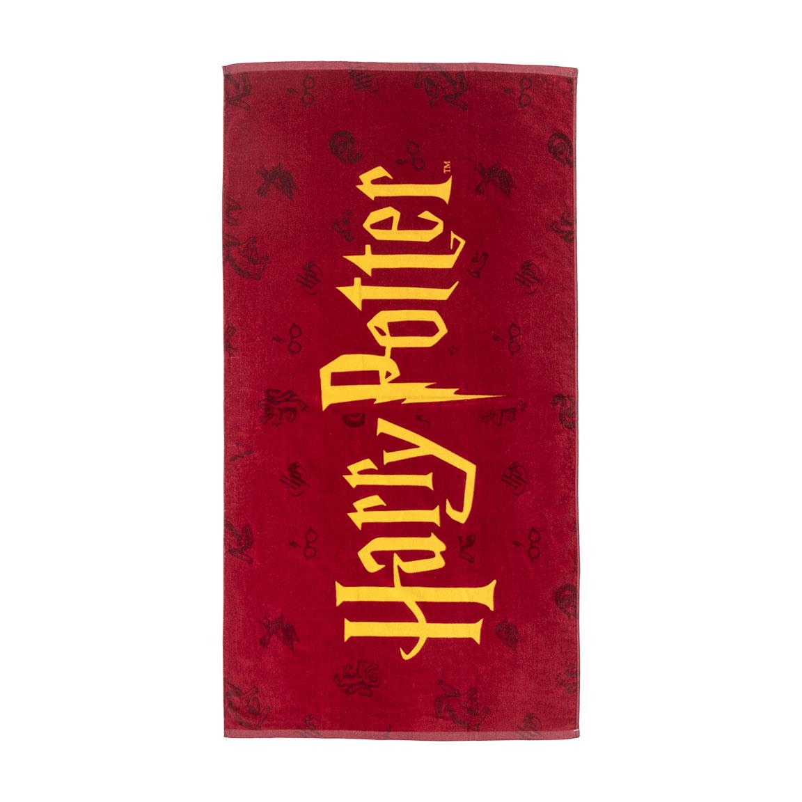 Serviette Harry Potter – Logo officiel – 140 x 70 cm – Polyester. Fond rouge avec inscription dorée Harry Potter. Un accessoire indispensable pour les fans de la saga magique.