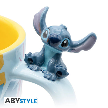 Mug Lilo & Stitch – Stitch Hawaïen – 460 ml. Mug 3D en céramique avec figurine Stitch sur l’anse, visuels tropicaux et inscription « Ohana means family », produit officiel ABYstyle.