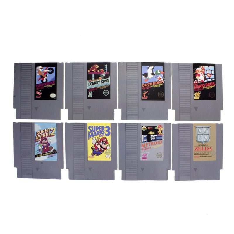 Sous-verres Nintendo NES – Lot de 8 cartouches classiques. Dessins des jeux cultes Zelda, Mario, Donkey Kong, Metroid. Accessoire rétro-gaming officiel Nintendo.