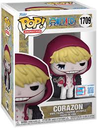 "Funko Pop! Corazon (1709) – One Piece. Figurine exclusive avec sticker Fall Convention NYCC 2024 – Limited Edition, représentant Corazon dans sa tenue emblématique avec capuche rouge et manteau noir à plumes. Édition rare pour les fans de One Piece et les collectionneurs de Funko."