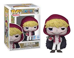 "Funko Pop! Corazon (1709) – One Piece. Figurine exclusive avec sticker Fall Convention NYCC 2024 – Limited Edition, représentant Corazon dans sa tenue emblématique avec capuche rouge et manteau noir à plumes. Édition rare pour les fans de One Piece et les collectionneurs de Funko."