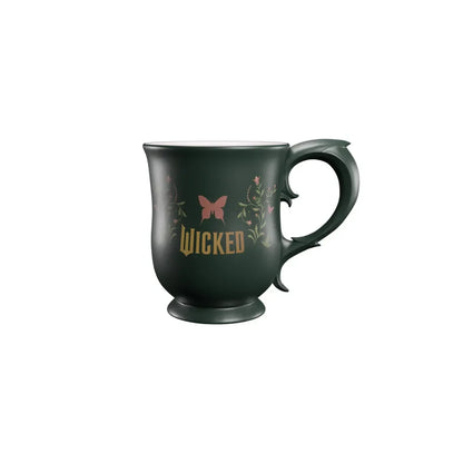 Mug Wicked Partie 2 – 350 ml. Mug premium en céramique avec deux motifs différents : logo Wicked avec chapeau d’un côté, papillon et décor floral de l’autre.