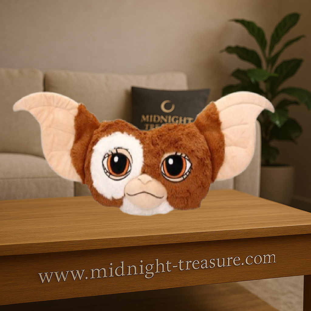 Coussin Gremlins – Modèle Gizmo – Grand format 73 x 30 x 14 cm. Coussin en peluche ultra doux à l’effigie du célèbre Mogwaï, sous licence officielle. Idéal pour la déco et les fans de cinéma culte.

