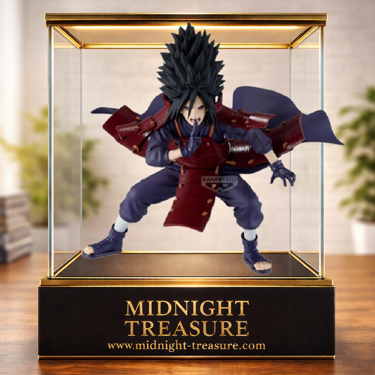 Figurine Naruto Shippuden – Madara Uchiha – Vibration Stars – 17 cm – Banpresto Bandai Spirits. Madara porte son armure rouge emblématique et réalise un mudra de ninjutsu dans une pose de combat dynamique. Une figurine détaillée parfaite pour les fans de Naruto Shippuden.