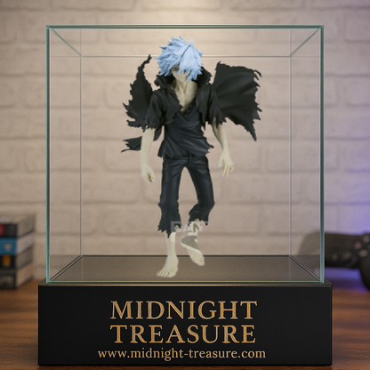 Figurine My Hero Academia – Tomura Shigaraki – 18 cm – Banpresto. Tenue en lambeaux, regard sombre et posture menaçante. Une figurine fidèle pour les fans de vilains et de l’univers MHA.