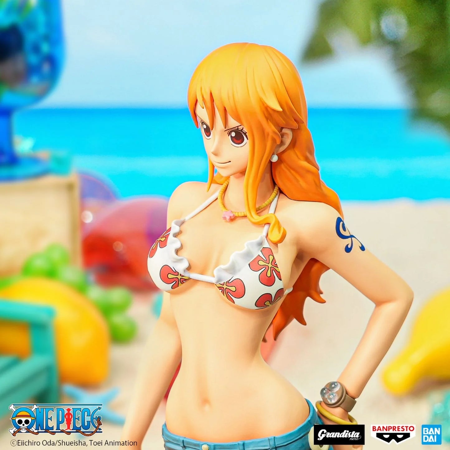 Figurine One Piece – Nami – Grandista Nero – 28 cm – Banpresto. Nami dans une pose élégante, vêtue de sa tenue estivale emblématique. Une figurine détaillée parfaite pour les fans de One Piece.