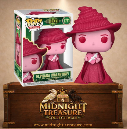 Funko Pop! Movies N°1711 – Elphaba Valentine's Day – Wicked. Figurine Elphaba rouge tenant une lettre en forme de cœur.