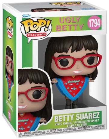 Funko Pop! Ugly Betty – Betty Suarez (N°1794). Figurine représentant Betty avec ses lunettes rouges, son poncho “Guadalajara” et son sourire iconique.