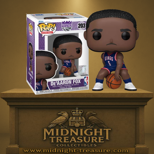 Funko Pop! NBA – De'Aaron Fox – N°203 – Sacramento Kings – 9 cm – Funko. Fox accroupi avec un ballon, en maillot rétro bleu. Une Pop! dynamique pour les fans de NBA et des Kings.