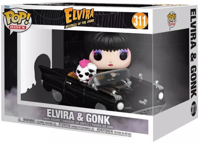 Funko Pop! Mistress of the Dark – Elvira & Gonk (N°311). Elvira dans sa voiture noire décorée, accompagnée de son chien à crête rose. Une figurine détaillée et gothique pour les fans d’Elvira.

