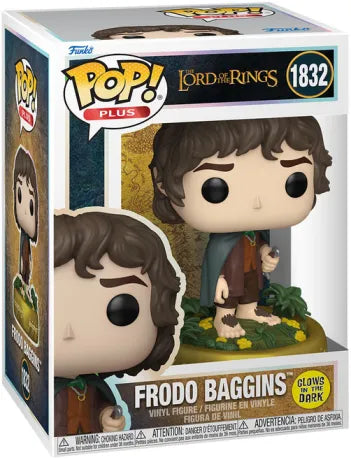 Funko Pop! Le Seigneur des Anneaux – Frodon Sacquet (N°1832, Glow in the Dark). Figurine exclusive avec socle doré orné des inscriptions de l’Anneau Unique. Effet phosphorescent idéal pour les fans de Tolkien.