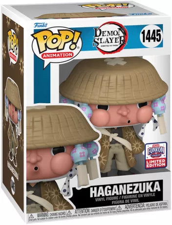 Figurine Funko Pop! Haganezuka (1445) de Demon Slayer, représentant le forgeron masqué avec son chapeau de paille et sa tenue traditionnelle, en édition limitée FunKon Exclusive