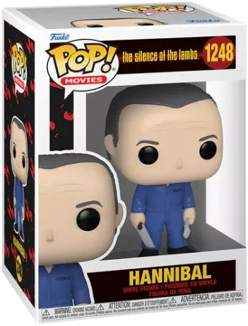Funko Pop! The Silence of the Lambs – Hannibal Lecter (N°1248). Figurine du tueur en tenue bleue tenant un couteau et une fourchette, design fidèle au film culte.