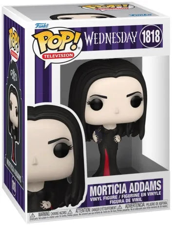Funko Pop! Wednesday – Morticia Addams (N°1818). Figurine représentant Morticia dans sa robe noire fendue et tenant un livre. Une pièce élégante et gothique pour les fans de la Famille Addams.
