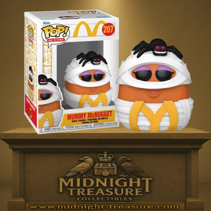 Funko Pop! McDonald’s – Mummy McNugget (N°207). Figurine représentant un McNugget déguisé en momie avec une araignée noire sur la tête. Une pièce rétro et fun pour les fans de McDonald’s.