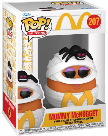 Funko Pop! McDonald’s – Mummy McNugget (N°207). Figurine représentant un McNugget déguisé en momie avec une araignée noire sur la tête. Une pièce rétro et fun pour les fans de McDonald’s.