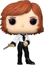 Figurine Funko Pop! Mylène Farmer (427) en édition exclusive, portant une chemise blanche avec nœud noir, un pantalon en cuir et tenant un pistolet doré