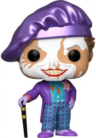 "Funko Pop! The Joker 337 - Batman 1989 (Chase). Figurine d'occasion avec un impact sur la boîte côté gauche. The Joker en costume violet, maquillage effacé, version Chase exclusive avec sticker. Une pièce rare pour les fans de DC Comics et de Batman."