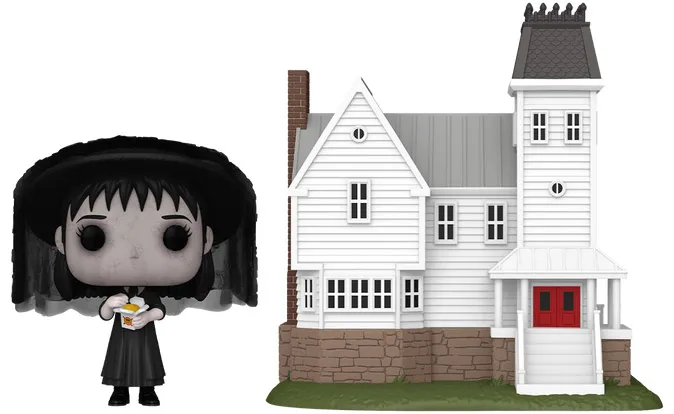 Funko Pop! Town Beetlejuice – Lydia Deetz avec Résidence Maitland (N°47). Lydia en tenue noire avec voile, tenant un livret, accompagnée de la maison blanche iconique aux détails soignés. Figurine et décor parfaits pour les fans de Beetlejuice.

