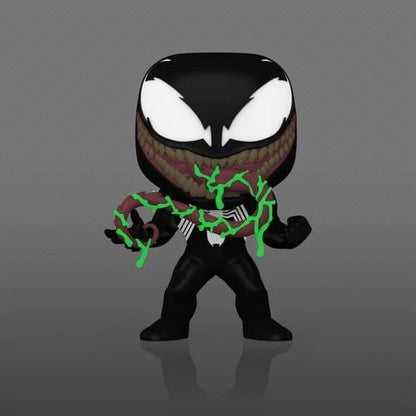 Funko Pop! Marvel – Venom (N°1469, Glow in the Dark). Figurine exclusive avec costume noir, bouche carnassière et effets verts fluorescents lumineux. Une pièce culte et effrayante pour les fans de Marvel.