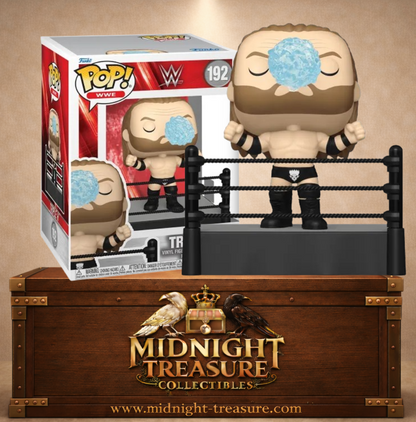 Funko Pop! WWE N°192 Triple H sur un ring reproduisant son célèbre Water Spit avec effet d’eau bleu translucide.
