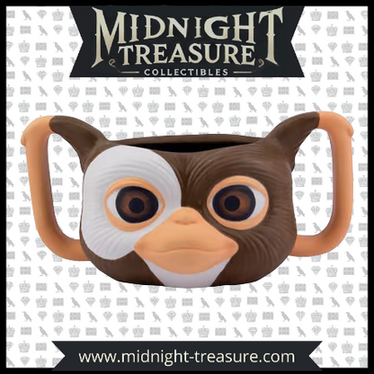 "Mug Gremlins en forme de Gizmo - 550ml. Mug en céramique fidèle au design du Mogwai culte. Idéal pour les fans du film Gremlins. Produit sous licence officielle.