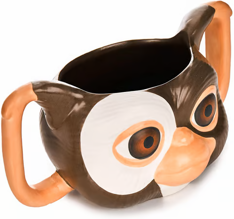 Mug Gremlins en forme de Gizmo - 550ml. Mug en céramique fidèle au design du Mogwai culte. Idéal pour les fans du film Gremlins. Produit sous licence officielle.