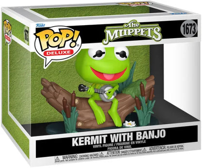 Funko Pop! Deluxe The Muppets – Kermit with Banjo (N°1673). Kermit la grenouille assis sur un tronc, jouant du banjo, dans un décor de marais emblématique.