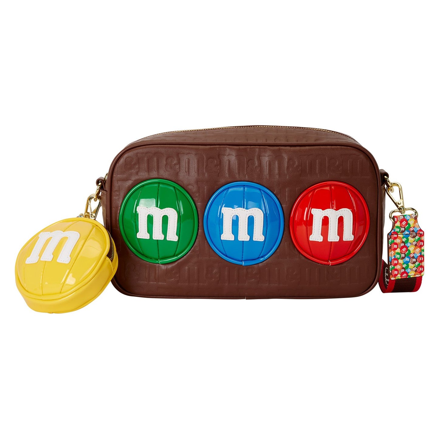 Sac à bandoulière Loungefly M&M’s avec porte-monnaie. Design chocolat embossé avec pastilles colorées et doublure intérieure exclusive. Accessoire collector parfait pour les fans de M&M’s.