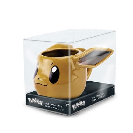 Mug 3D Évoli – Pokémon – 385 ml – Céramique dolomite. Un mug sculpté en relief représentant le visage d’Évoli avec ses grandes oreilles en 3D et ses yeux expressifs. Parfait pour les fans de Pokémon et les collectionneurs."