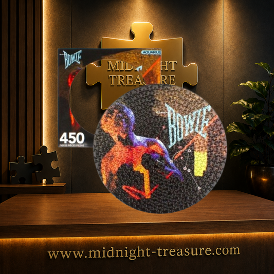 Puzzle David Bowie Let's Dance Picture Disc – 450 pièces – diamètre 31 cm. Puzzle rond officiel Aquarius reproduisant la pochette du célèbre album Let's Dance sous la forme d'un disque vinyle collector.