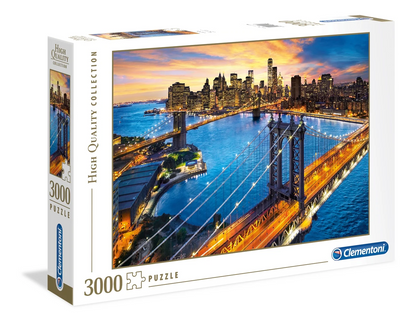 Puzzle New York Skyline – 3000 pièces – Clementoni. Vue panoramique de Manhattan au coucher du soleil avec ponts et gratte-ciels. Un puzzle grand format pour les fans de voyages et d’architecture.