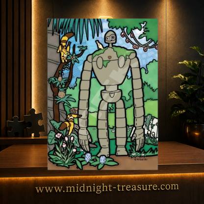 Puzzle vitrail Le Château dans le ciel – Robot jardinier – 126 pièces Ensky – 10 x 14,7 cm. Puzzle transparent Art Crystal représentant le robot gardien de Laputa entouré de végétation et d’animaux.