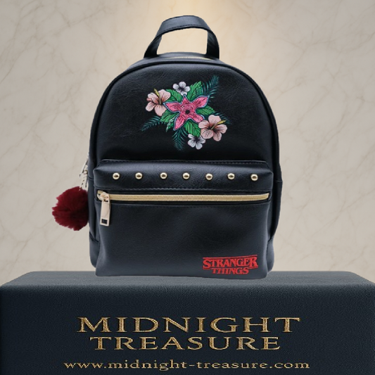 Sac à dos Demogorgon Stranger Things noir avec motif floral, licence officielle, dimensions 28 x 22 x 11 cm, design élégant inspiré de la série Netflix.