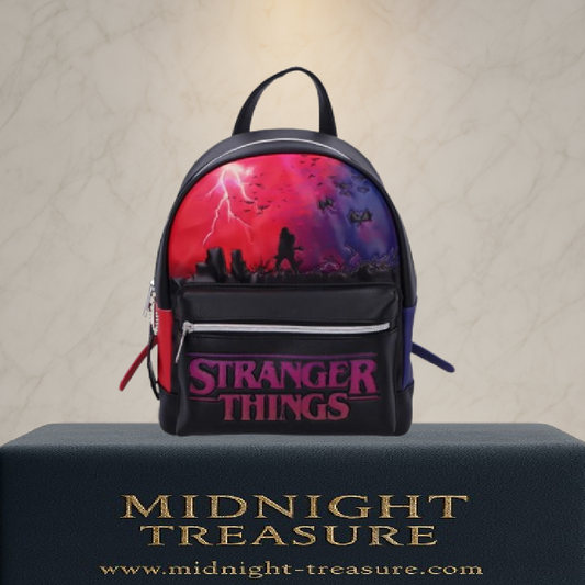 Sac à dos Stranger Things The Upside Down – environ 28 cm. Sac en simili cuir avec illustration de l’Upside Down, logo Stranger Things en relief et bretelles bicolores inspirées de la série Netflix.