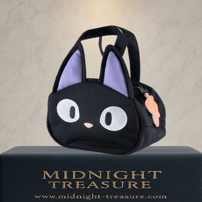 Sac à lunch Jiji – Kiki la Petite Sorcière – 150 x 180 x 120 mm – Studio Ghibli. Sac kawaii noir avec visage de Jiji et oreilles en relief, parfait pour transporter repas et snacks.
