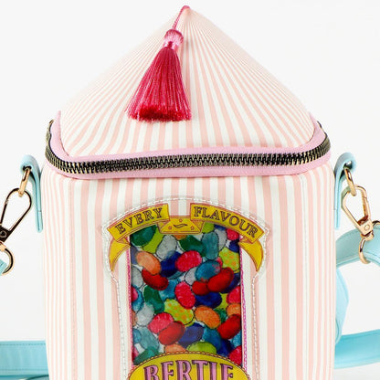 Sac à bandoulière Harry Potter – Honeydukes – 22,5 x 12 x 12 cm. Sac en forme de boîte Bertie Bott’s, avec rayures pastel, bandeau Every Flavour Beans et bandoulière bleu pastel.