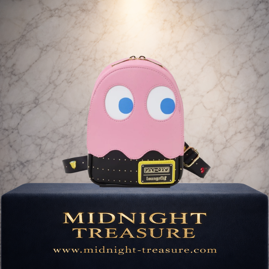 Sac sling bandoulière Loungefly PAC-MAN Pinky Ghost – 15 x 22 x 5 cm. Sac rose inspiré du célèbre fantôme de PAC-MAN avec effet phosphorescent glow in the dark et détails rétro arcade.