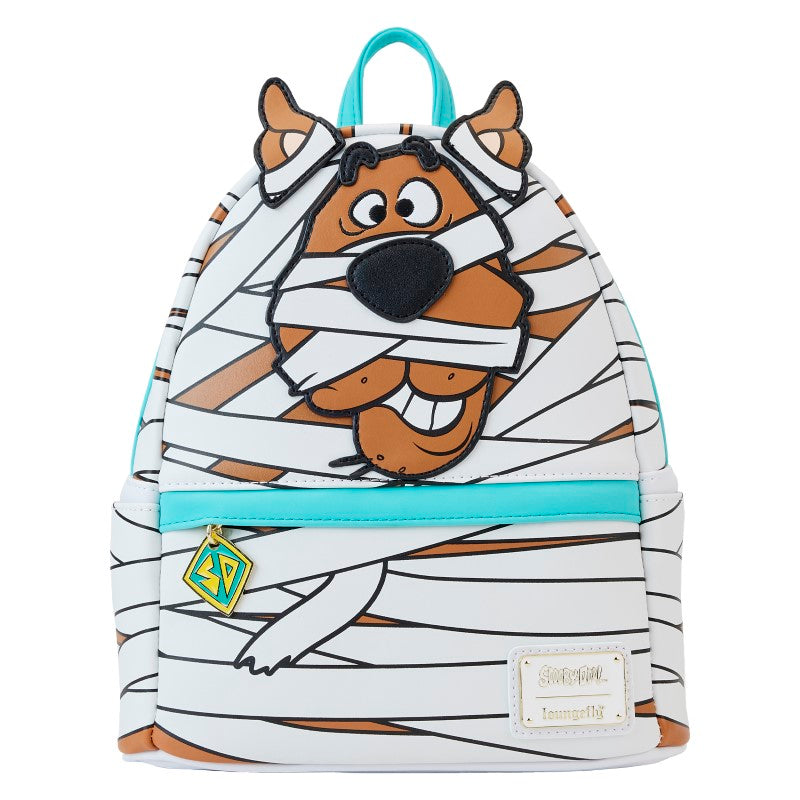 Sac à dos mini Loungefly – Scooby-Doo – Mummy Cosplay – 23 x 27 x 11 cm. Sac blanc et marron avec design de Scooby en momie, effet lumineux dans le noir et breloque logo Mystery Machine.

