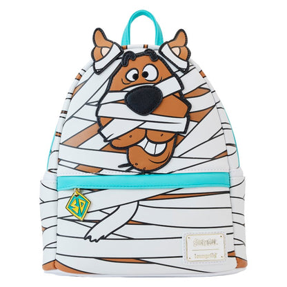 Sac à dos mini Loungefly – Scooby-Doo – Mummy Cosplay – 23 x 27 x 11 cm. Sac blanc et marron avec design de Scooby en momie, effet lumineux dans le noir et breloque logo Mystery Machine.

