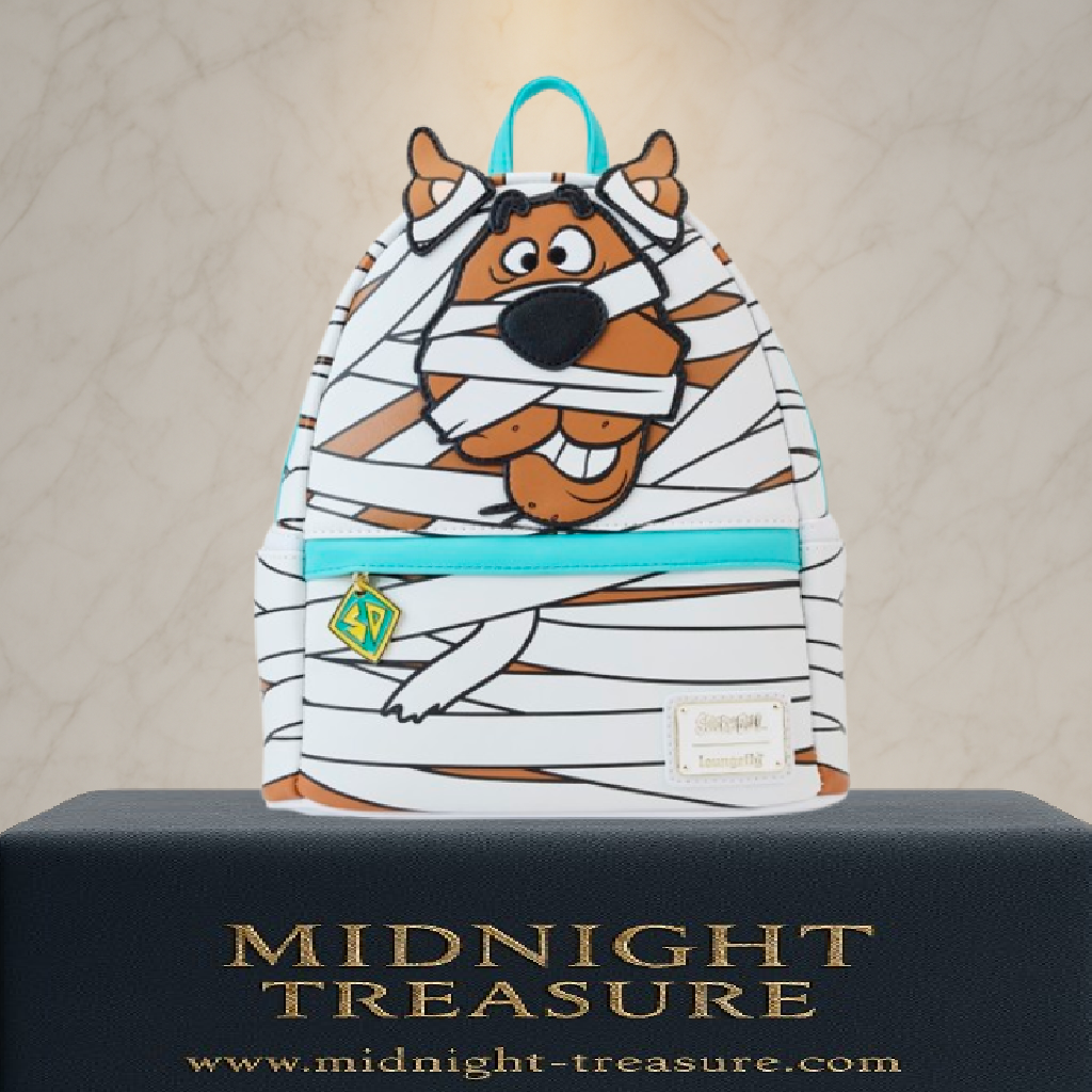 Sac à dos mini Loungefly – Scooby-Doo – Mummy Cosplay – 23 x 27 x 11 cm. Sac blanc et marron avec design de Scooby en momie, effet lumineux dans le noir et breloque logo Mystery Machine.

