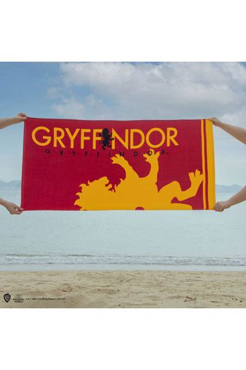 Serviette Harry Potter – Maison Gryffondor – 140 x 70 cm – 100 % coton. Design rouge et or avec lion emblématique. Parfaite pour représenter ta maison préférée avec fierté.