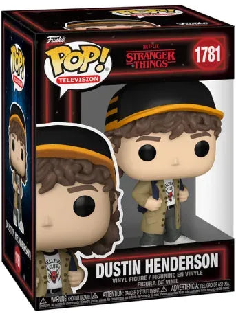 Funko Pop! Stranger Things – Dustin Henderson (N°1781). Figurine avec casquette noire et jaune et t-shirt Hellfire Club.