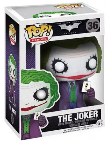 Funko Pop! The Dark Knight – The Joker (N°36). Joker en costume violet avec carte en main, maquillage blanc et cheveux verts. Figurine détaillée et culte pour les fans de DC.