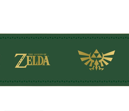 Mug The Legend of Zelda – Insigne d’Hyrule – 460 ml – ABYstyle. Mug en céramique vert et or, orné de la Triforce dorée, symbole mythique du royaume d’Hyrule.