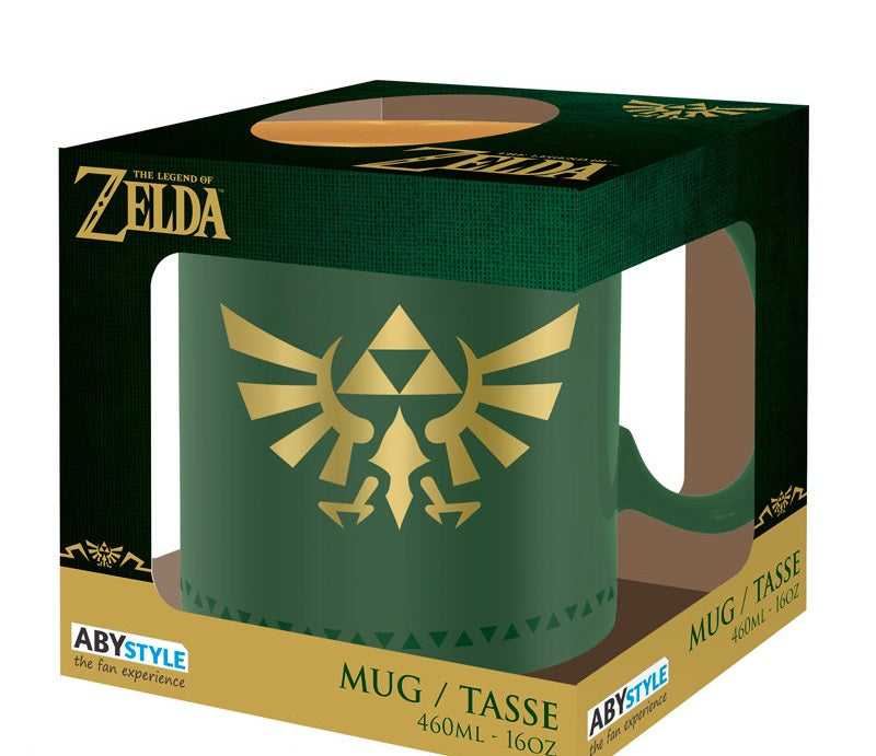 Mug The Legend of Zelda – Insigne d’Hyrule – 460 ml – ABYstyle. Mug en céramique vert et or, orné de la Triforce dorée, symbole mythique du royaume d’Hyrule.