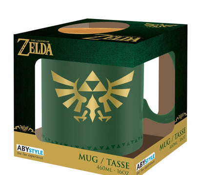 Mug The Legend of Zelda – Insigne d’Hyrule – 460 ml – ABYstyle. Mug en céramique vert et or, orné de la Triforce dorée, symbole mythique du royaume d’Hyrule.